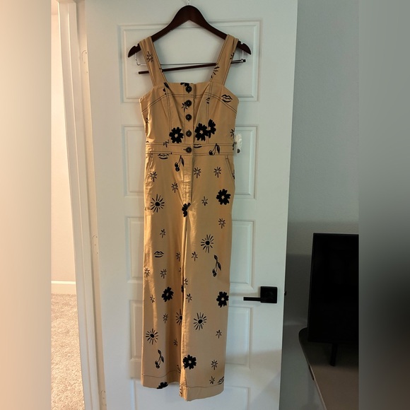 Anthropologie Dresses & Skirts - Anthropologie Mustard Jumpsuit with Black Floral Print